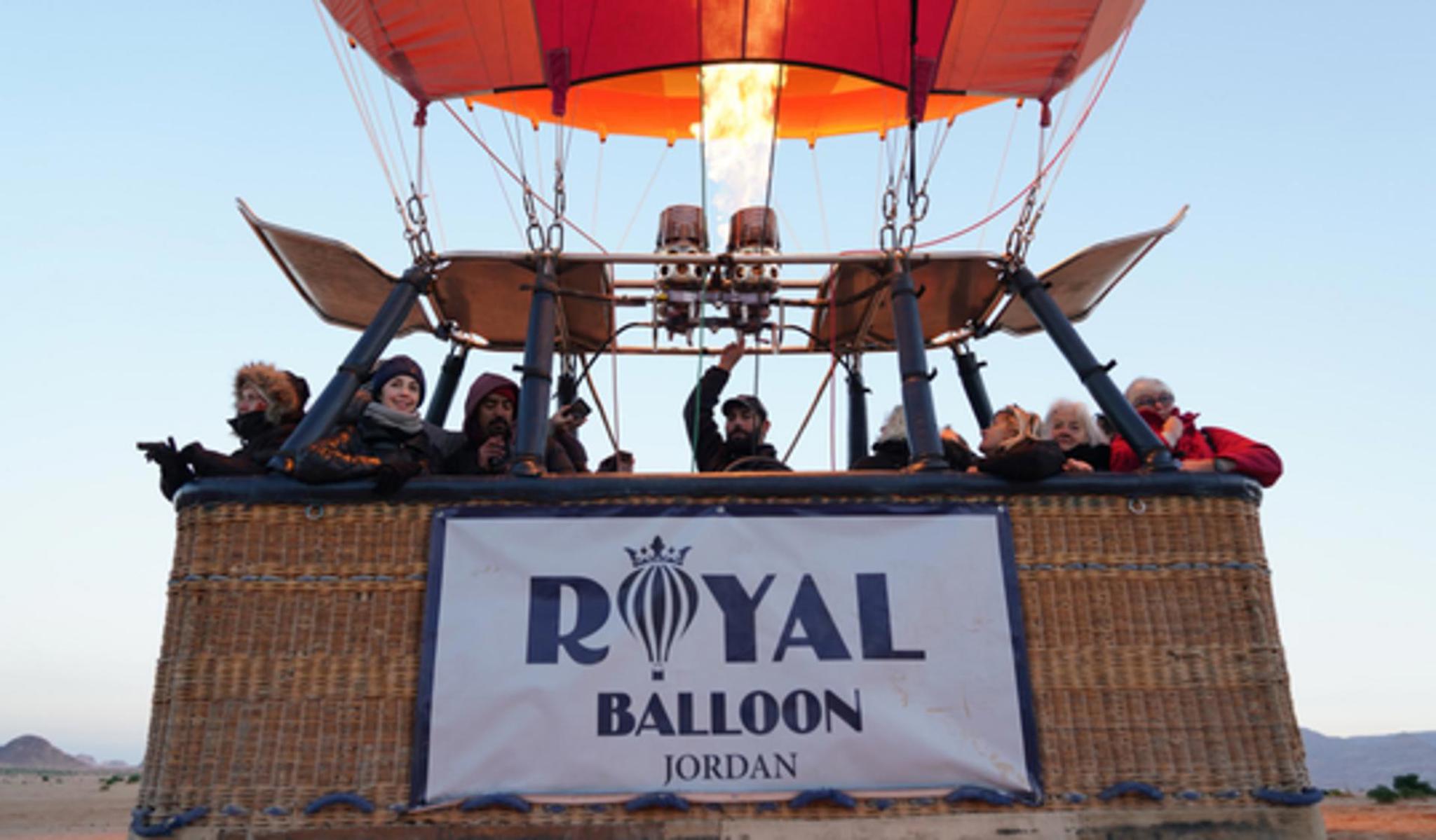 <p><strong>Wadi Rum Hot Air Balloon Rides</strong> are one of the <strong>best ways to discover and explore</strong> the area of Wadi Rum. While you are watching the <strong>scenic view of rocks, valleys and different colors of sand</strong> from your Hot Air Balloon, you will close your eyes and listen to the <strong>sound of silence and peace</strong>.</p>
<p><strong>Wadi Rum Balloon Flights</strong> are getting <strong>more popular every year</strong> due to <strong>perfect weather conditions</strong> and <strong>amazing scenery</strong> which Wadi Rum offers to the guests from all around the World.</p>
<p><strong>Royal Balloon – Jordan</strong>, in partnership with the <strong>Royal Aero Sports Club of Jordan</strong>, operates Hot Air Balloon Flights over the <strong>spectacular and breathtaking landscape of Wadi Rum</strong>. Experienced – <strong>Worldwide known Hot Air Balloon Pilots</strong> of <strong>Royal Balloon – Jordan</strong> will be delighted to see you on board and take you for an <strong>unforgettable Wadi Rum Balloon Tour</strong>.</p>
<p><strong>Ballooning in Wadi Rum</strong>, is without doubt a <strong>“must do”</strong> and let us treat you Royal with a <strong>Luxury and Exclusive Hot Air Balloon Adventure</strong> over Wadi Rum.</p>